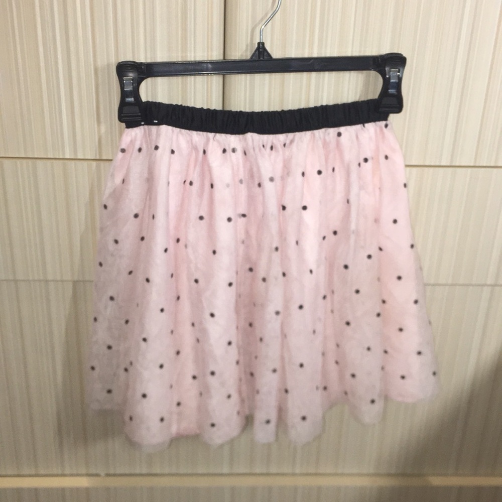 pink skirt with polka dots